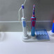 Держатель для электрической зубной щетки Oral-B с отсеком сменных щеток